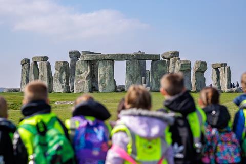 School children overlooking Stonehenge in Wiltshire